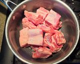 A picture of step 1 of Pork Ribs in Hatch Chile Sauce with Nopales.