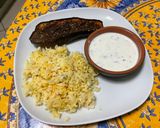 Une image de l'étape 10 de Aubergine rôtie au miel et épices, sauce yaourt et riz au safran.