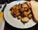 Foto del paso 7 de la receta Alitas al horno con patatas y cebolla
