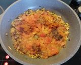 A picture of step 3 of Madurai egg kari dosa.