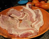 A picture of step 1 of Pork Chops Cooked in Milk and Herbs.