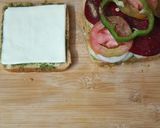 A picture of step 6 of Cheesy Vegetable Masala Grilled Sandwich.