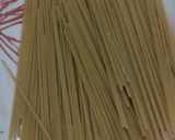A picture of step 1 of Jellof macaroni with spaghetti.