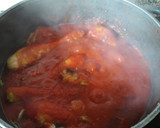 Foto del paso 3 de la receta: Pollo y conejo con tomate y ajos tiernos