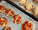 A picture of step 4 of Easy Mini English Muffin Pizzas.