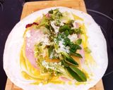 A picture of step 2 of Mini Ham and Cream Cheese Wraps.