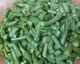 A picture of step 1 of Beans Poriyal.