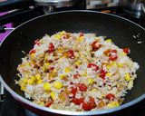 A picture of step 6 of Thai style fried rice with vegetables and tofu.