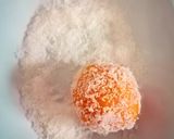 A picture of step 16 of Pumpkin coconut ladoo.