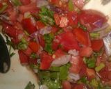 A picture of step 3 of Smokie served with kachumbali.