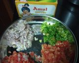 A picture of step 1 of Cheesy masala pav.