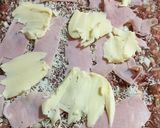 Foto del paso 2 de la receta: Pan de Carne Relleno con Jamón y Mozzarella al verdeo con cheddar