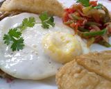 A picture of step 5 of Poached eggs,samosa,hash browns and kachumbari.