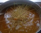 A picture of step 2 of Macroni and spaghetti.