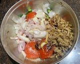 A picture of step 4 of Kaddi patalghanta chudchuda (Roasted tomato with bamboo shoots).
