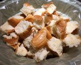 A picture of step 2 of Crock Pot S’mores Bread Pudding.