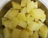 A picture of step 2 of Suki bhaji (potato sabji).