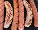 A picture of step 2 of Frankfurter and bratwurst mixed grill with my currywurst sauce.