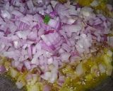 A picture of step 3 of (Brinjal)Baigan ka Bharta in Green Onions.