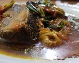 A picture of step 5 of Hilsa haldi pani.