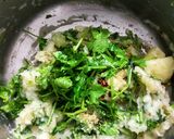 A picture of step 2 of Aloo Afghani Bolani served with cheesy yoghurt sauce.