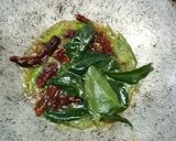 A picture of step 6 of Chicken 65.