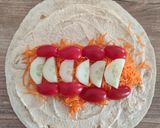 Une image de l'étape 2 de Wraps Végétariens au Houmous et Crudités.