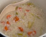 A picture of step 4 of Chicken congee.