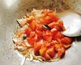 A picture of step 7 of Tomato Tehri with Heat shape.