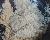 A picture of step 1 of Jaggery semolina makhany ka halwa.