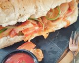 A picture of step 10 of Chicken fajita sub.
