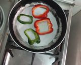 A picture of step 2 of Bell pepper fried eggs.