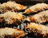 Foto del paso 5 de la receta: Berenjenas rellenas de pollo, jamón y salchichas al horno