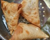 A picture of step 13 of Poha onion triangle samosa.