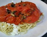 A picture of step 6 of Spaghetti with herby, garlic roasted tomatoes and feta cheese .