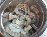 A picture of step 1 of Chicken & Shrimp Miki Bihon Guisado.