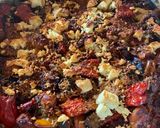 A picture of step 6 of Greek peppers and sausage bake with feta.