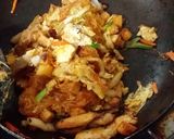 A picture of step 6 of Pad Thai Glass Noodles with Chicken Wrapped in Egg.