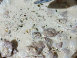 Penne Rigatti con lomo de cerdo en salsa blanca