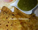 A picture of step 3 of Aloo ka paratha with green chutney.