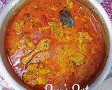 A picture of step 5 of Murgir Laal Jhol.
