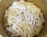 Foto langkah ke 3 dari resep Kentang Goreng Frozen French Fries Kriuk Tak Berminyak.