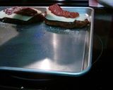 A picture of step 12 of Chicken Parmesan With Spaghetti and Garlic Bread.
