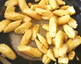 A picture of step 1 of Baby corn masala curry.