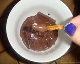 A picture of step 10 of Orange peels- dates and raisins chocolate candy.