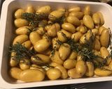 Une image de l'étape 6 de Pommes grenailles au thym, ail et romarin.