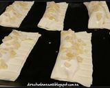 Foto del paso 7 de la receta Cañas de hojaldre rellenas de crema pastelera