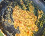 A picture of step 7 of Anda Bhurji.