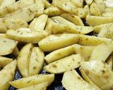 A picture of step 3 of Baked Herbed Potatoes with kachumbari and sauce.