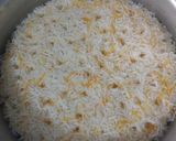 A picture of step 7 of Garlic-carrot rice.